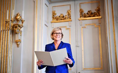 The Permanent Secretary of the Swedish Academy, Ingrid Carlberg, announces that Canadian author Anne Carson is awarded the Nobel Prize in Literature 2026, in Stockholm, Sweden, October 8, 2026. TT News Agency/Christine Olsson via REUTERS ATTENTION EDITORS - THIS IMAGE WAS PROVIDED BY A THIRD PARTY. SWEDEN OUT. NO COMMERCIAL OR EDITORIAL SALES IN SWEDEN.