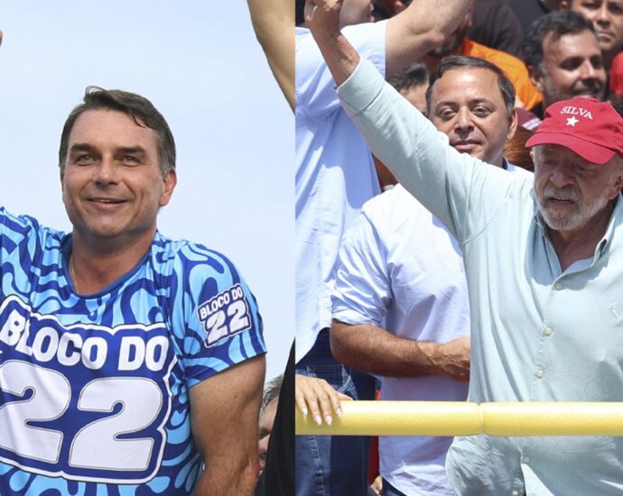 Flávio Bolsonaro e Lula reúnem apoiadores no último dia de campanha