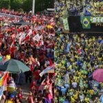 Atos de Lula e Flávio Bolsonaro reúnem apoiadores a 2 km de distância em Brasília